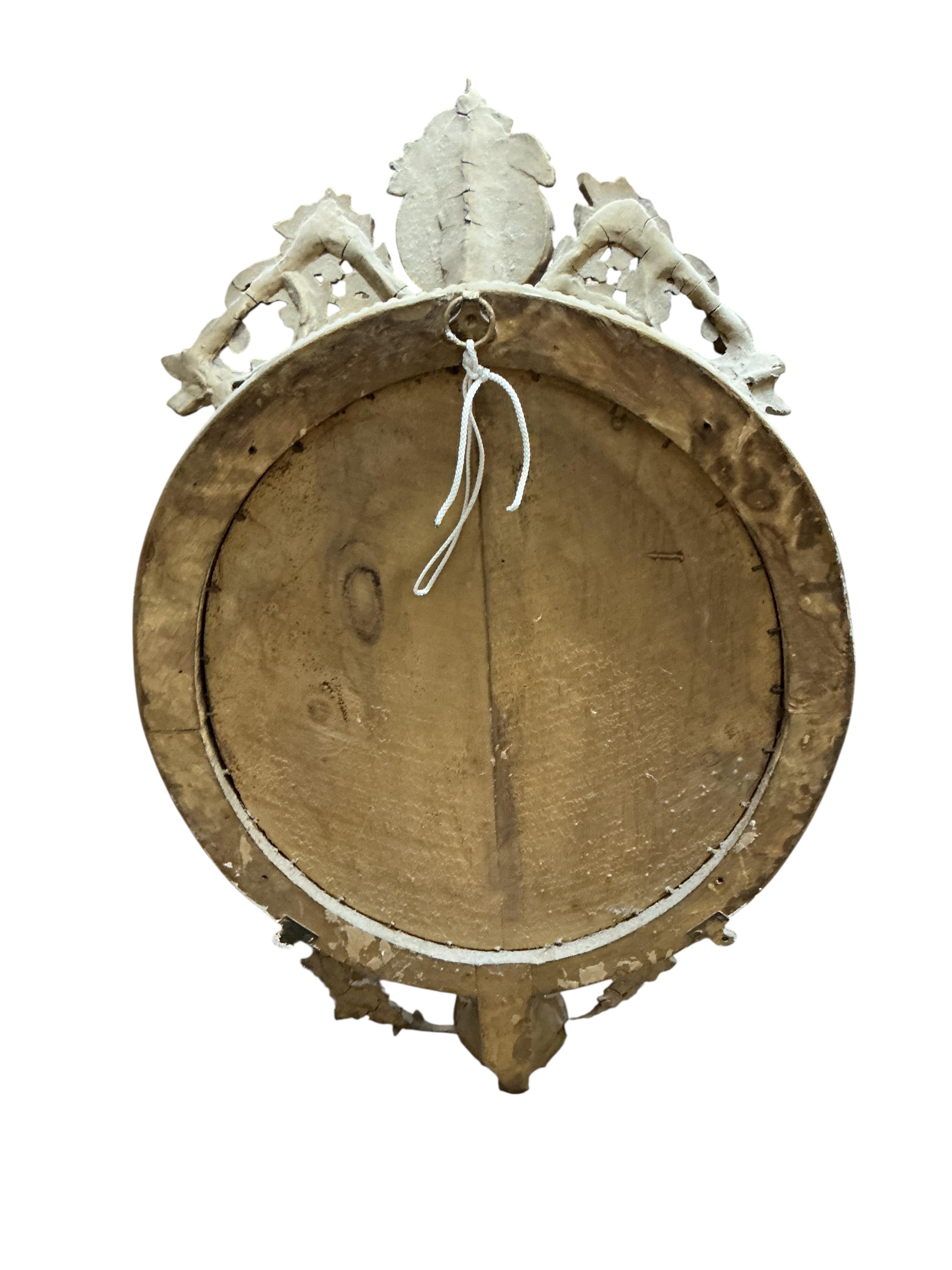 A Victorian giltwood and composition girandole wall mirror, re-painted, width 44cm, height 78cm